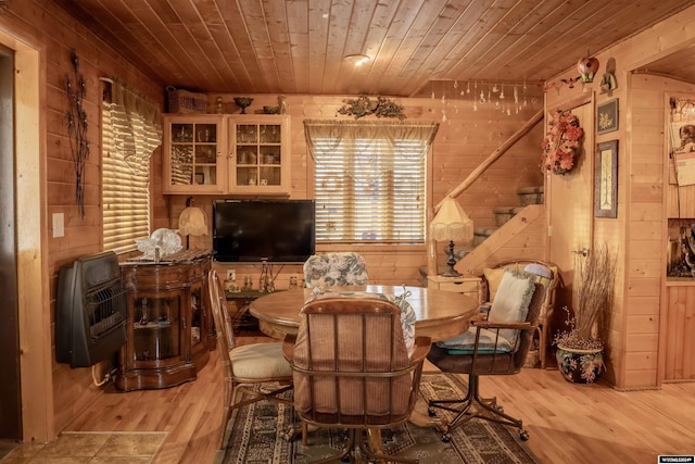 43 Red Cliff Dr, Lander, WY 82520 - living area with heating unit, wood finished floors, wooden walls, and wooden ceiling