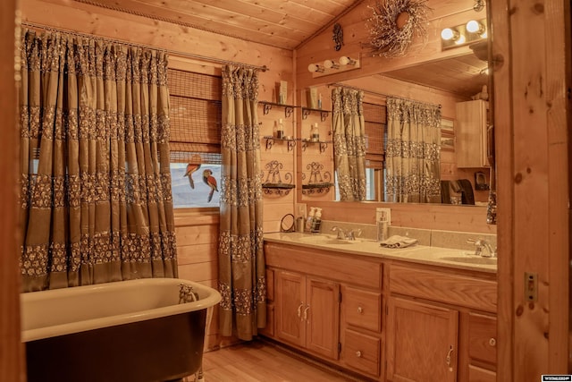 43 Red Cliff Dr, Lander, WY 82520 - full bath featuring wood finished floors, a sink, wood ceiling, and lofted ceiling