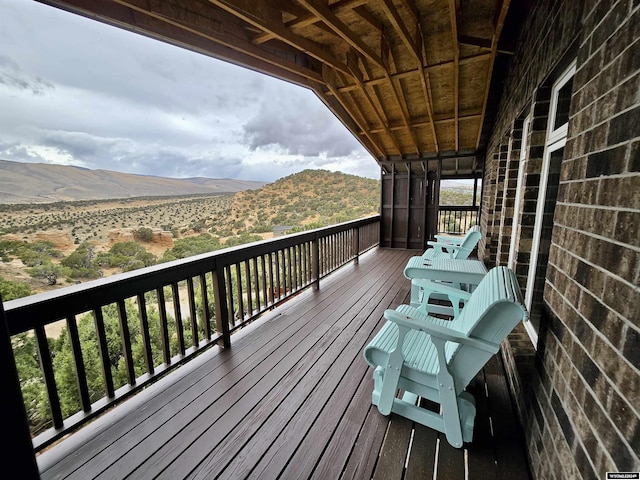 43 Red Cliff Dr, Lander, WY 82520 - wooden terrace featuring a mountain view