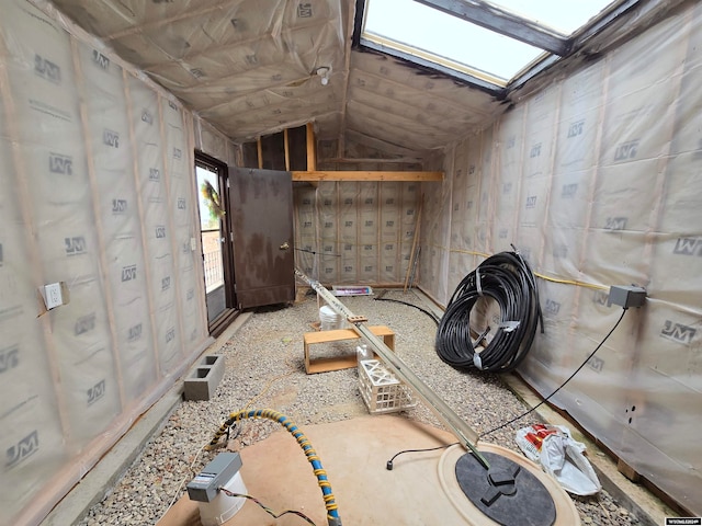 miscellaneous room featuring lofted ceiling