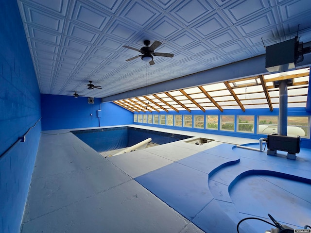 view of pool featuring a patio and ceiling fan