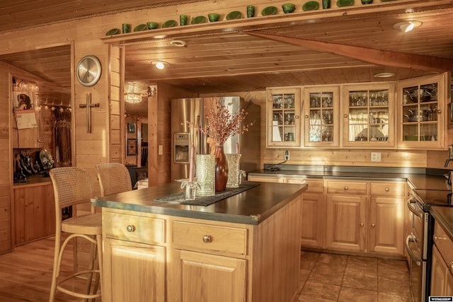 43 Red Cliff Dr, Lander, WY 82520 - bar featuring appliances with stainless steel finishes, wooden walls, and wooden ceiling