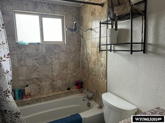 bathroom featuring toilet and shower / bathtub combination with curtain