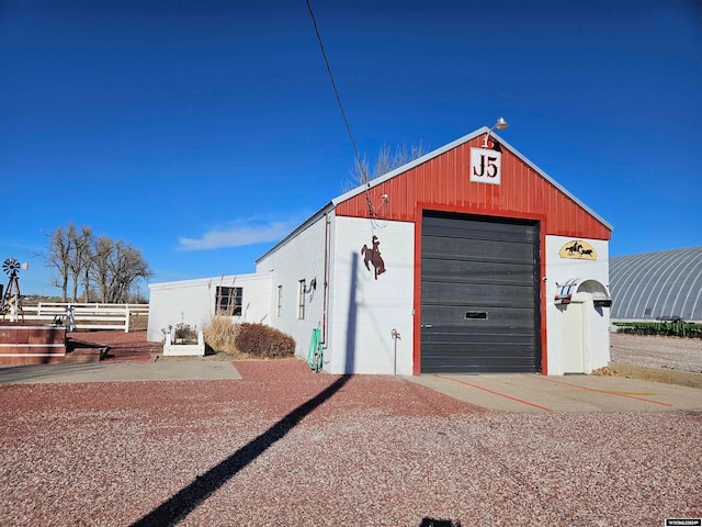 exterior space with a garage