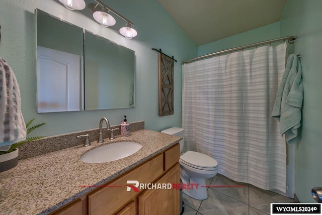 bathroom with toilet, curtained shower, vanity, and tile patterned flooring