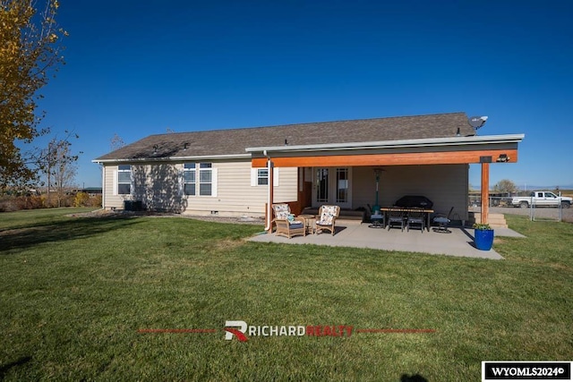 back of house with a patio, a lawn, and an outdoor hangout area