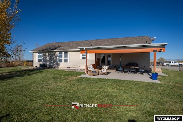 1559 Rd 13, Worland, WY 82401 - back of house with a patio area