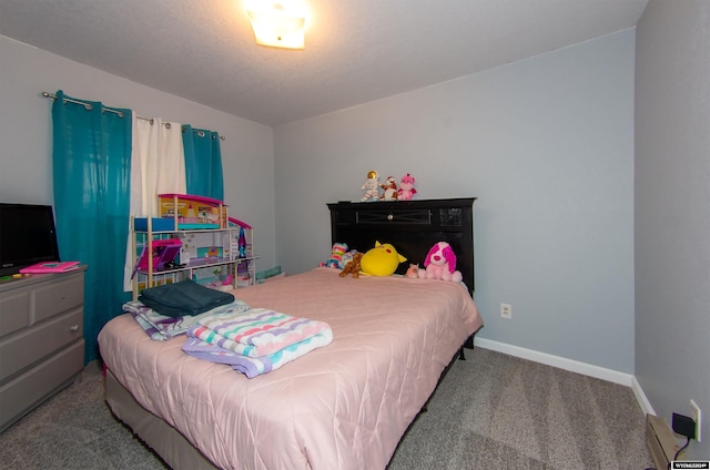 bedroom featuring light colored carpet