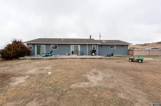 rear view of property with a deck