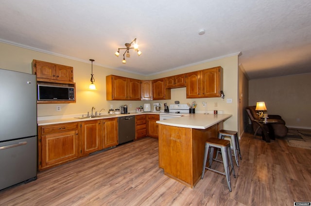 kitchen featuring white range, black dishwasher, stainless steel fridge, built in microwave, and light wood-type flooring