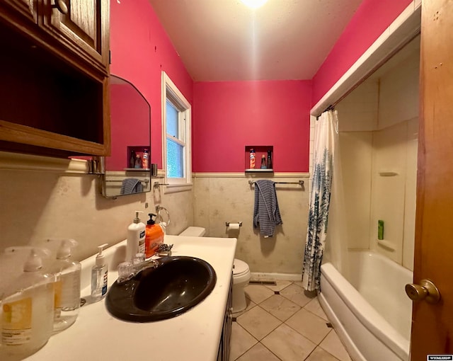 full bathroom featuring vanity, toilet, shower / bath combo, and tile patterned flooring