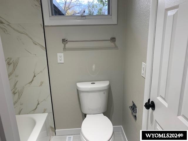 bathroom featuring toilet