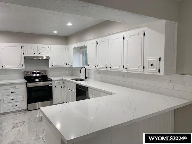 kitchen featuring kitchen peninsula, white cabinetry, stainless steel range with electric stovetop, and sink