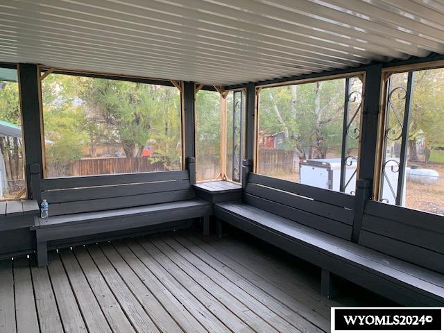 unfurnished sunroom with a healthy amount of sunlight