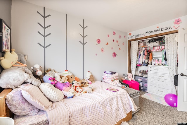 carpeted bedroom featuring a closet