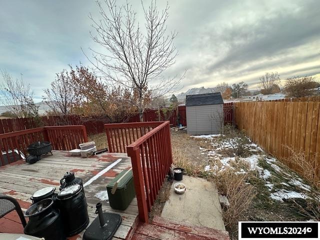 deck featuring a storage shed