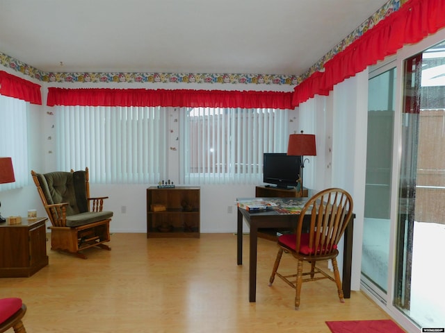 home office featuring hardwood / wood-style floors