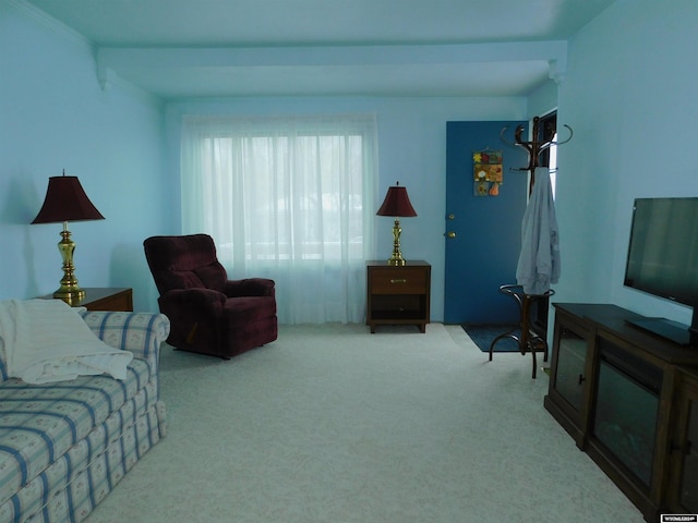 carpeted living room with crown molding