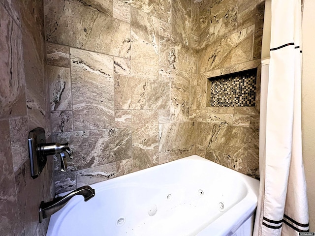 bathroom featuring a washtub