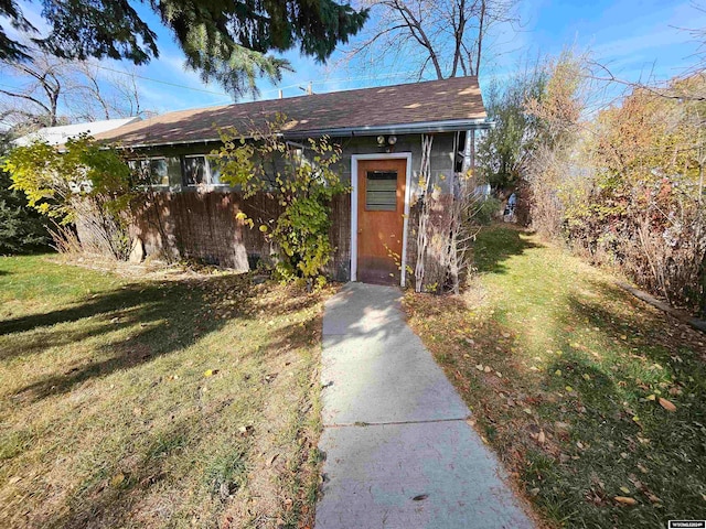 exterior space featuring a front lawn