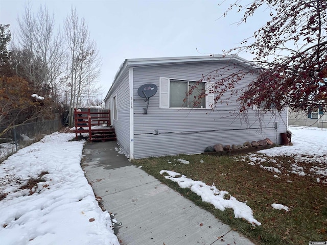 view of front facade featuring a deck