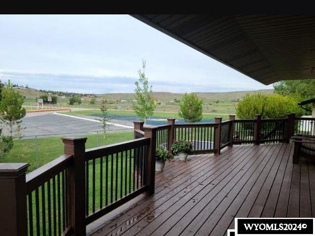 deck featuring a lawn