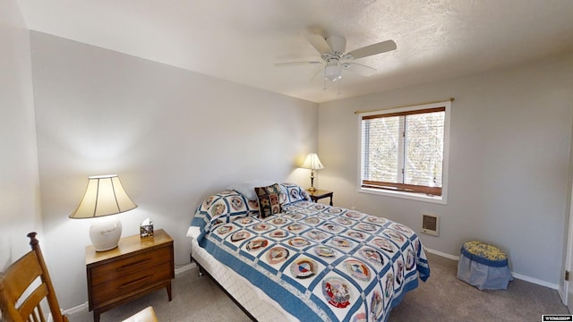 bedroom featuring ceiling fan and carpet flooring