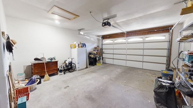 garage featuring a garage door opener