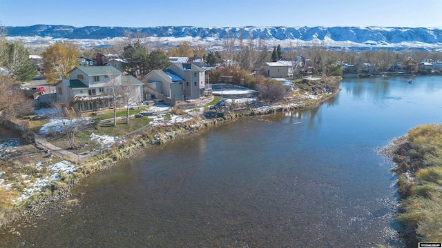 bird's eye view featuring a water and mountain view