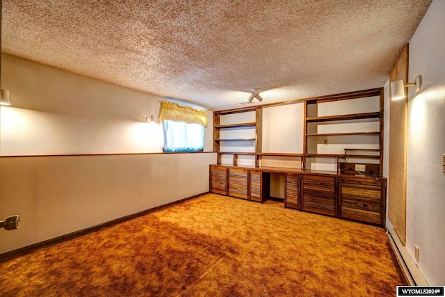 interior space with a textured ceiling and carpet floors