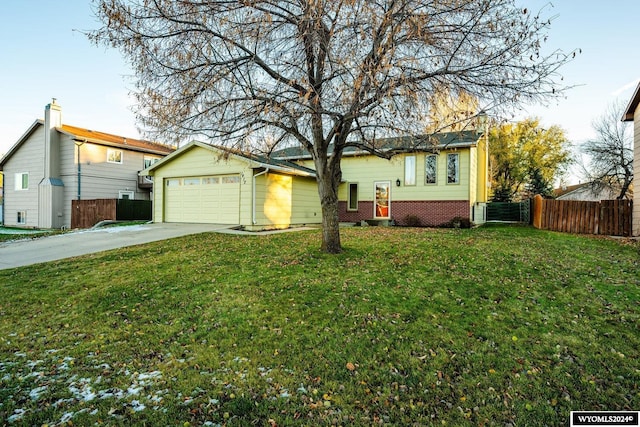 ranch-style house with a front lawn and a garage