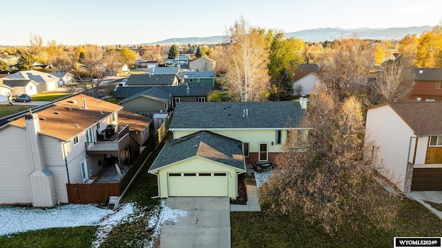 birds eye view of property with a mountain view