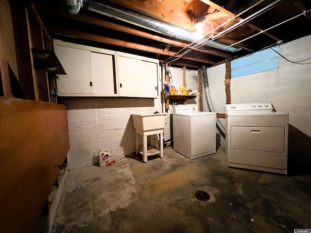 basement featuring washing machine and dryer