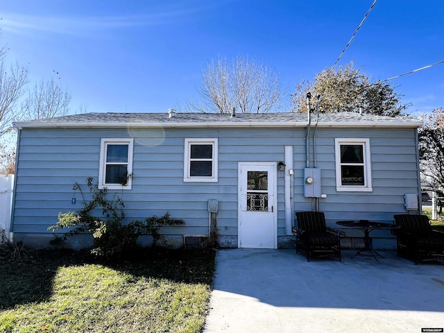 back of property with a patio area