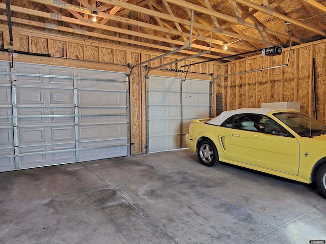 garage featuring a garage door opener