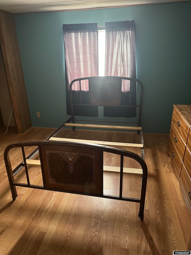 bedroom featuring hardwood / wood-style flooring