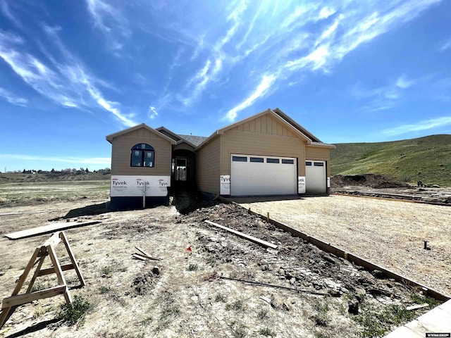 4921 Tranquility Way, Casper, WY 82601 - view of front of home featuring driveway and a garage
