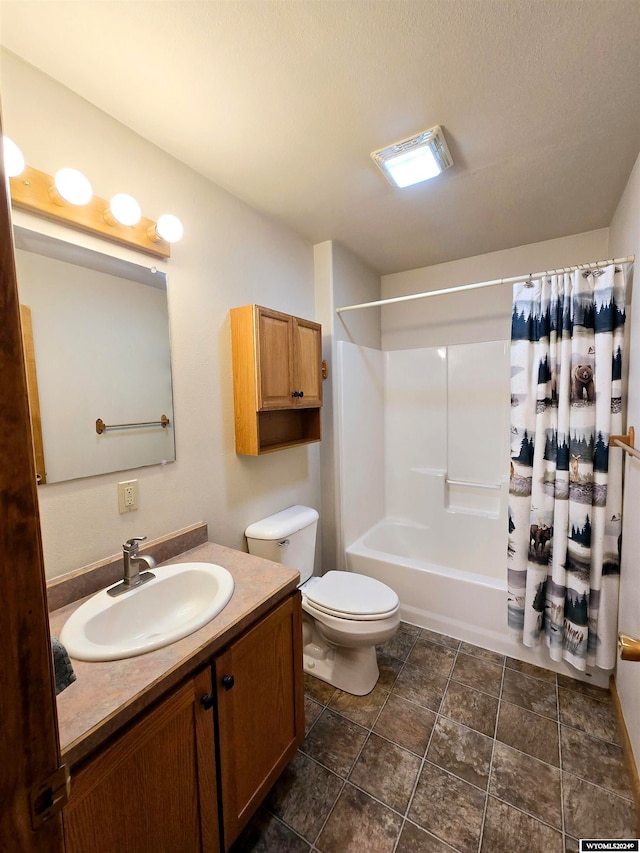 full bathroom featuring vanity, shower / bathtub combination with curtain, a textured ceiling, and toilet