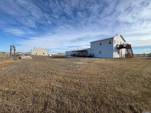 view of yard with a deck