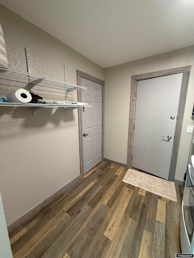 entrance foyer with dark hardwood / wood-style flooring