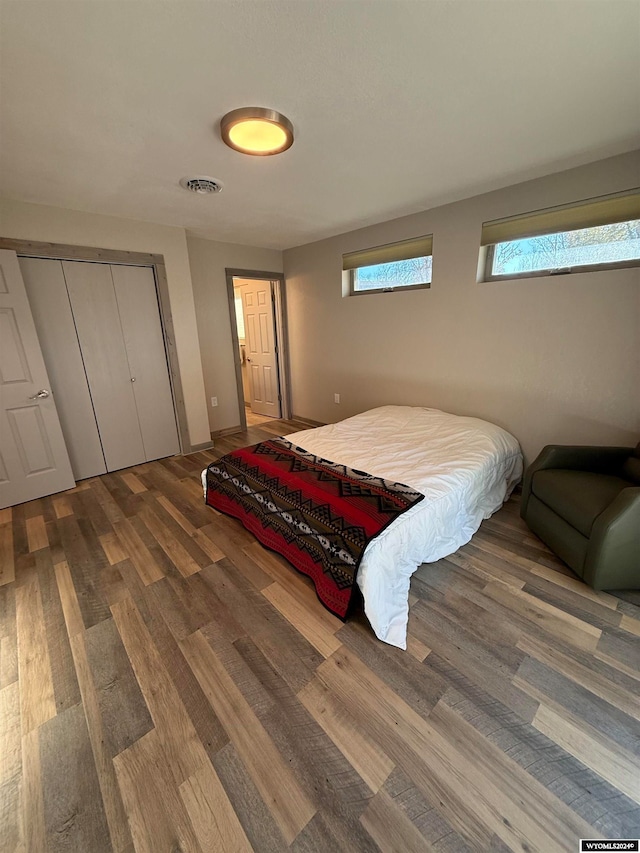 bedroom with wood-type flooring