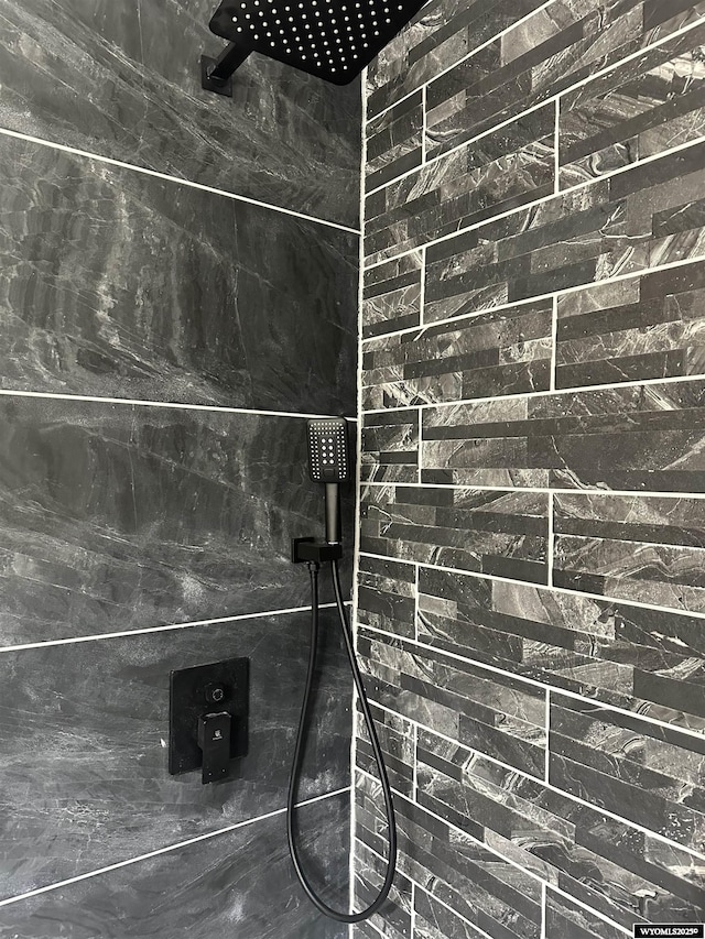 room details with a tile shower