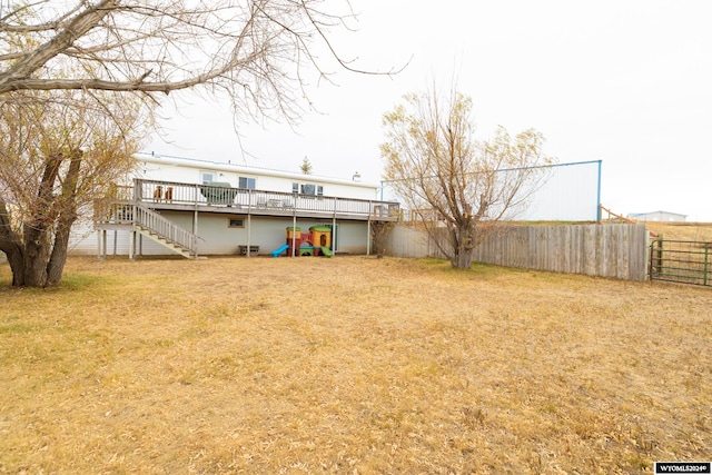 view of yard featuring a wooden deck