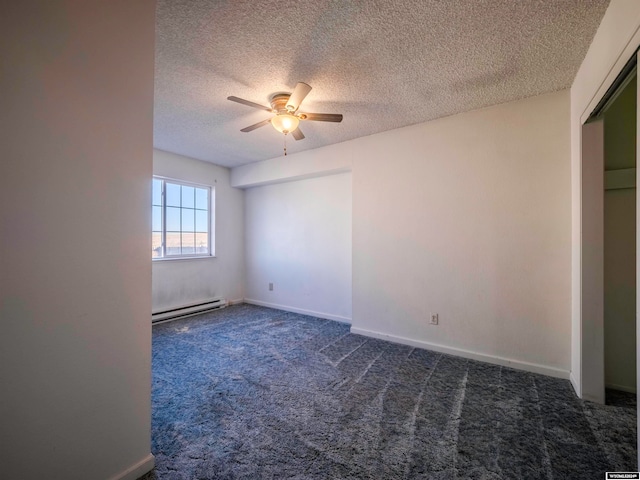 unfurnished room featuring baseboards, baseboard heating, ceiling fan, and dark carpet