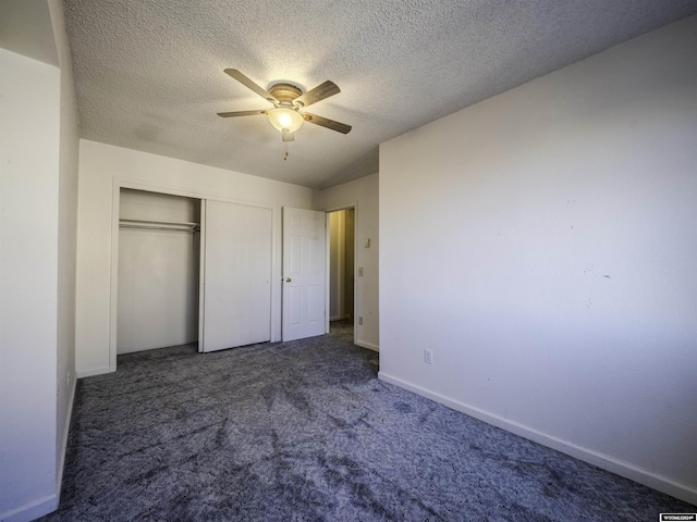909 Skyline Dr, Douglas, WY 82633 - unfurnished bedroom with a textured ceiling, baseboards, carpet, a closet, and ceiling fan