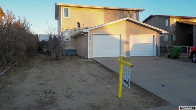 exterior space with an attached garage and driveway