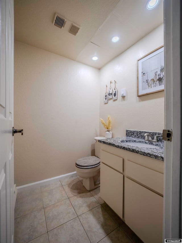 bathroom featuring tile patterned floors, visible vents, toilet, recessed lighting, and vanity