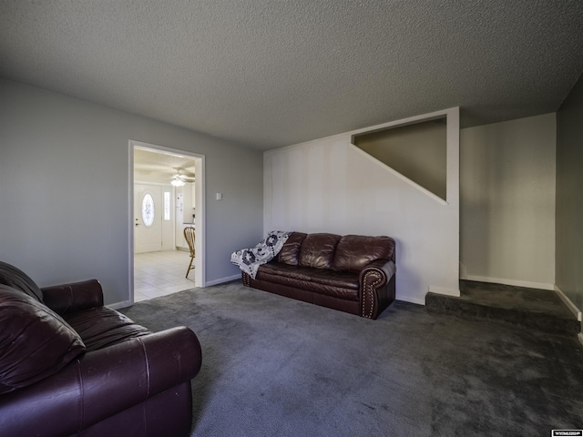 909 Skyline Dr, Douglas, WY 82633 - carpeted living room with a textured ceiling and a ceiling fan