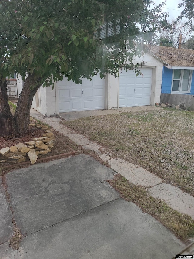 exterior space featuring a garage