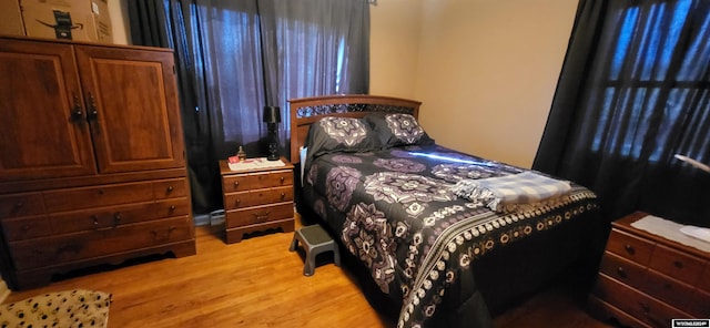 bedroom featuring light hardwood / wood-style floors